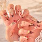 butterfly-petal-nailscherry-sweetheart-nailsy2k-nailsalmond-nailshand-painted-nails-1.jpg