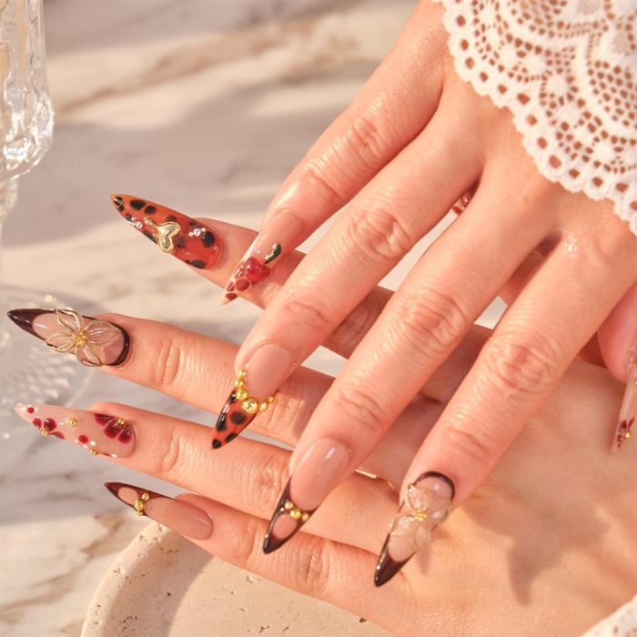 butterfly-petal-nailscherry-sweetheart-nailsy2k-nailsalmond-nailshand-painted-nails-2.jpg
