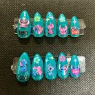 teal-glow-stitch-and-angel-press-on-nails-1.jpg